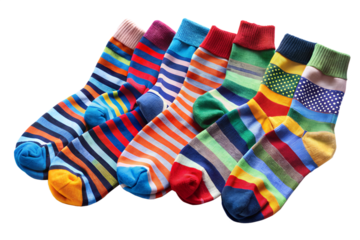 A vibrant collection of striped socks isolated on transparent background, showcasing a variety of colorful patterns and designs for cozy and stylish feet