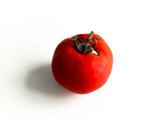 Close-up of a damaged tomato beginning to rot, showing white mold growth near the stem, isolated against a clean white background.

