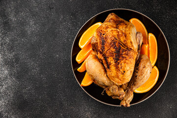 Baked chicken with oranges whole grilled chicken christmas holiday dish new year natural product...