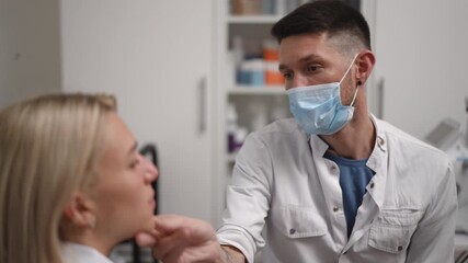 In a clinical setting, a medical professional thoroughly discusses a range of care options with a patient