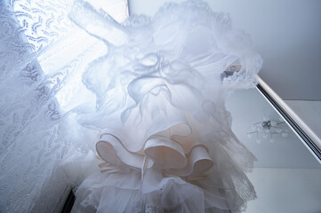 Elegant Wedding Dress Viewed From a Creative Upward Angle Indoors