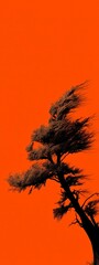 Abstract Tree Silhouette Against Vibrant Orange Sky