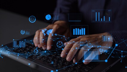 A close-up view of hands typing on a keyboard, surrounded by digital data overlays featuring various graphs and charts, illustrating technology role in business insights. Xenic
