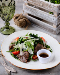 Indulge in a Delicious Salad that features Grilled Beef along