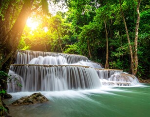 Serene cascading waterfall nestled within a lush, verdant forest, bathed in golden sunlight.
