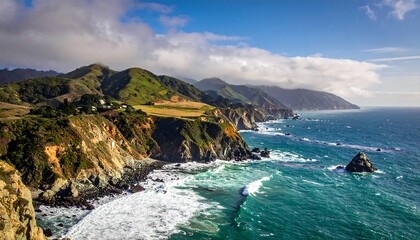 Fototapeta premium A breathtaking coastal landscape showcases dramatic cliffs meeting a churning ocean under a vibrant sky.