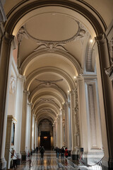 Archbasilica of Saint John Lateran Rome exterior facade and grand baroque interior with golden coffered ceiling vast nave marble statues side chapels ornate altar apse and dome Catholic basilica © Thao