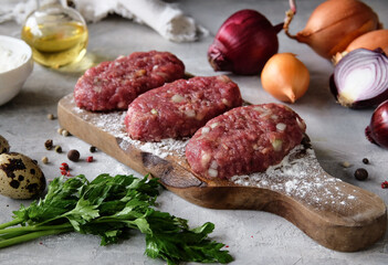 Delicious Freshly Prepared Meat Patties Accompanied by an Assortment of