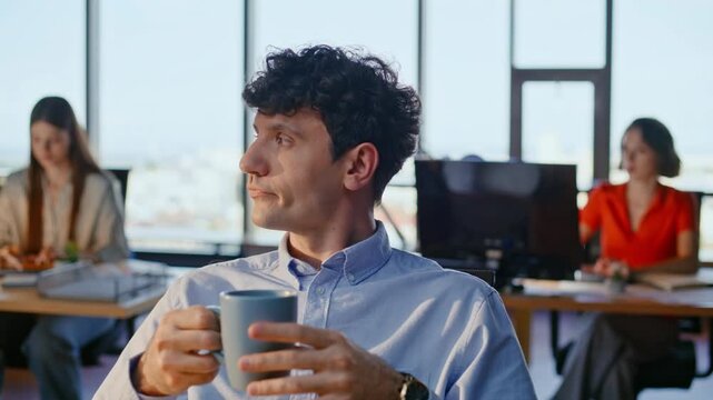 Office manager drinking tea sitting coworking closeup. Businessman making break