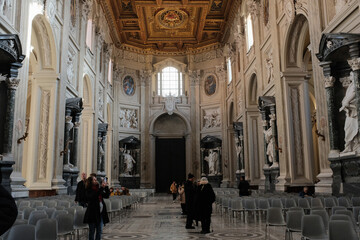 Archbasilica of Saint John Lateran interior Rome golden coffered ceiling marble columns statues ornate chapels baptistery and apse Catholic basilica Italy. High quality photo © Thao