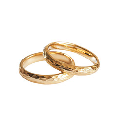 Two gold wedding ring rest gently, Two gold wedding rings resting gently on a soft surface, symbolizing love and commitment, isolated on transparent background