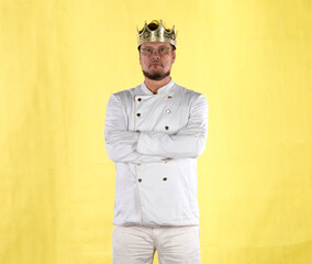 chef with a crown in a white suit on a yellow background