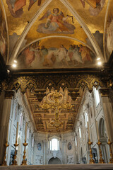 Archbasilica of Saint John Lateran interior Rome golden coffered ceiling marble columns statues ornate chapels baptistery and apse Catholic basilica Italy. High quality photo © Thao