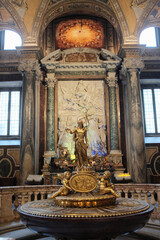 Basilica of Saint Mary Major Rome ornate gilded altar with reliquary marble columns baroque chapel interior sacred art vertical composition editorial use only. High quality photo © Thao