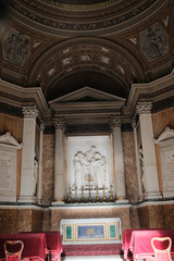 Archbasilica of Saint John Lateran Rome exterior facade and grand baroque interior with golden coffered ceiling vast nave marble statues side chapels ornate altar apse and dome Catholic basilica © Thao
