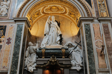 Archbasilica of Saint John Lateran interior Rome golden coffered ceiling marble columns statues ornate chapels baptistery and apse Catholic basilica Italy. High quality photo © Thao