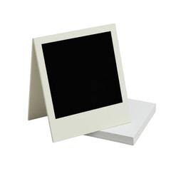 Pristine blank vintage Polaroid frame & stack of premium blank white photo paper, isolated on transparent with bright studio lighting, professional minimalist product display concept