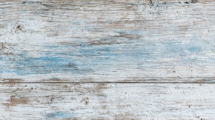 Fototapeta premium The rustic wooden surface features a blend of white and blue hues showcasing natural wear and tear. Perfect for art projects home decor or as a stylish backdrop.