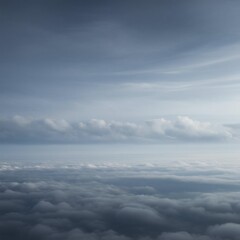 Obraz premium Vast Blue Sky Above Layered Clouds, Aerial View.