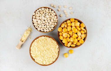 Gluten free lupine flour, dry lupine beans, protein rich snack of pickled lupine beans on gray background. Top view.