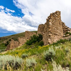 Fototapeta premium Ancient stone ruins on a hillside