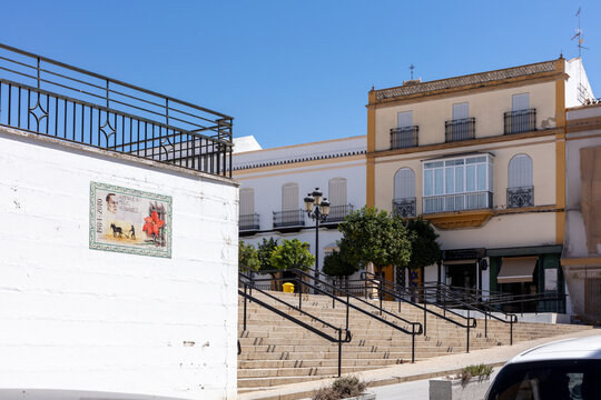 Marchena, Andalusia, Spain. 4 September 2025. Plaza with lamppost and church towers in background