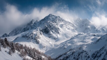 Majestic snow-covered mountains rise dramatically against a clear blue sky. Fluffy clouds float above, creating a peaceful winter atmosphere. The midday sun bathes the scene in soft light.