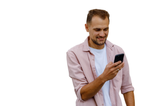 Young man smiling and checking smartphone, connecting with social media, communicating online, transparent background