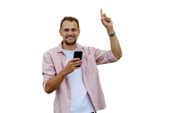 Smiling man holding phone, pointing finger up, showing new idea or important information on transparent background