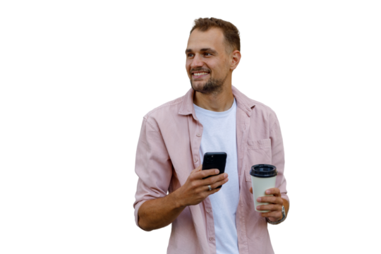 Happy man smiling, holding mobile phone and coffee cup, looking away, casual style, isolated on transparent background