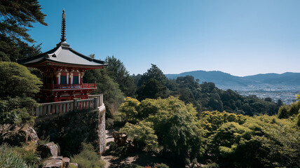 Fototapeta premium 夏の青空の下で山寺の塔と新緑が広がる風景