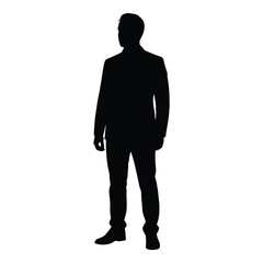 A dark figure of a man standing formally stark silhouette