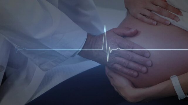 Healthcare pro placing hands on pregnant abdomen causing ECG waveform tracking fetal heartbeat