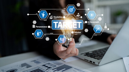 A visual representation of business strategy highlighting target achievement and innovation in a modern workspace, emphasizing determination and creativity in the corporate environment. Tessel