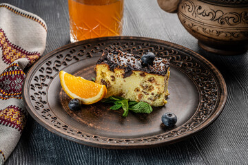 Baked cottage cheese cake with chocolate topping.