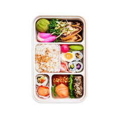 Overhead view of a Bento box lunch containing rice sushi rolls grilled fish eggs pickled vegetables and salmon