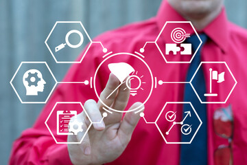 Business person using virtual touch screen presses the button of catching butterfly net and light bulb symbolizing: catch idea. Catching ideas business concept.