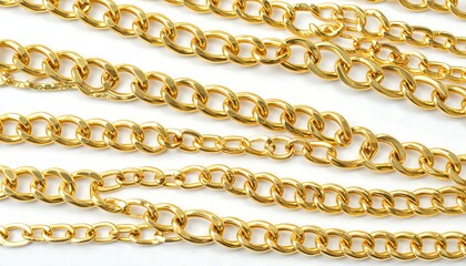 Gold chains laid out on white background