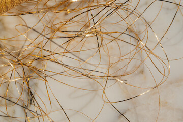 mess, tangle of gold thread