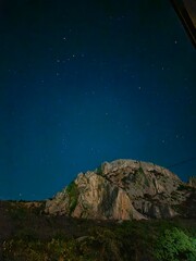 blue sky clouds sea sun sunset rocks ship