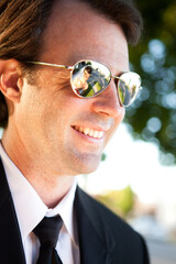 Bride Reflected in Happy Groom's Sunglasses