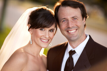 Happy, Young Bride and Groom Smiling Together - Portrait