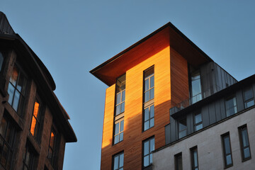 closeup of modern wooden building facades emphasizing their impact on energy efficiency
