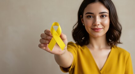 Holding the Ribbon: A person holds a yellow ribbon. Symbol of hope, support, and solidarity in this touching, heartfelt scene.