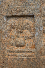 A carved statues . at the Buddhist stupa complex at the Gadaladeniya 