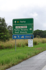 Directional sign pointing towards Tully, Tully Heads and Hull Heads on the Bruce Highway in Queensland, Australia