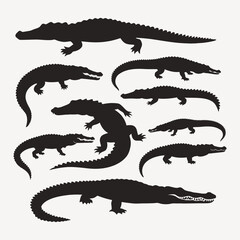 set of silhouettes of crocodiles