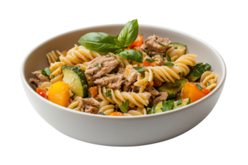 Delicious pasta bowl with vegetables and tuna, garnished with fresh basil.
