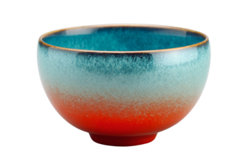 a blue and orange bowl on a white surface