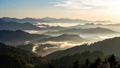Obraz premium Sunrise Over Misty Mountain Range